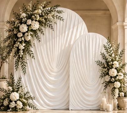 Deluxe package: ivory arches with full greenery styling and candles