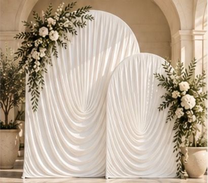 Signature package: ivory arches with faux greenery and white roses